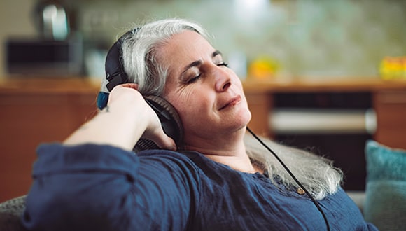 Woman relaxing with headphones