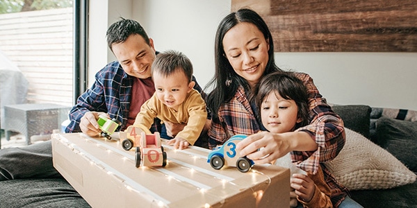 A family with HCF family cover playing together