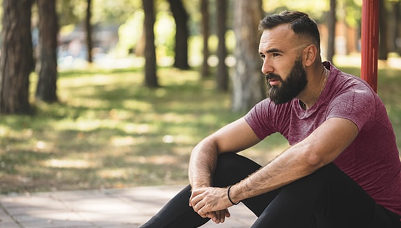 Man sitting on ground