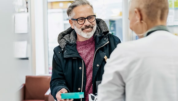 Man getting prescription medication