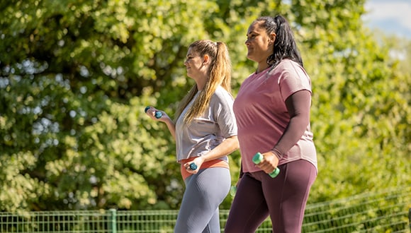 2 ladies walking outside