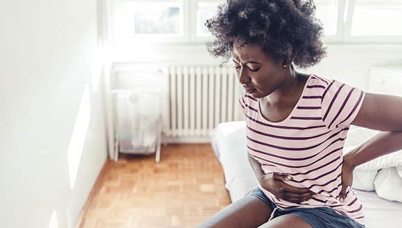 Lady managing bad gut health