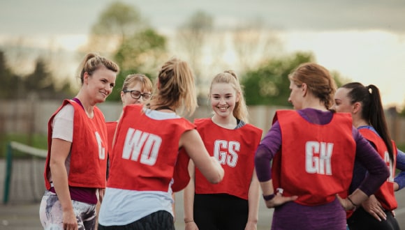 Girls on the court seeking the health benefits of playing netball