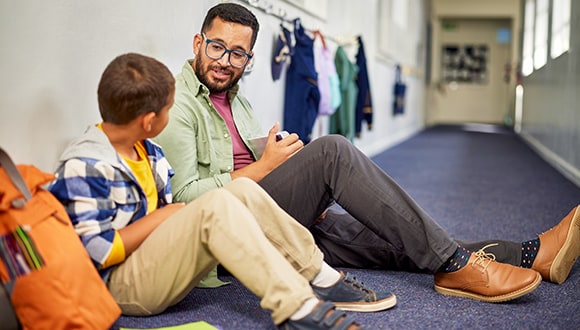 Father being a good listener while talking to teens about their mental health