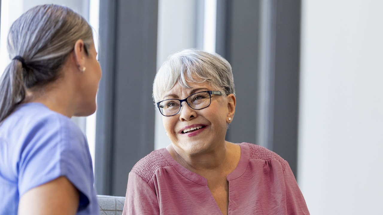 Women in hospital chatting